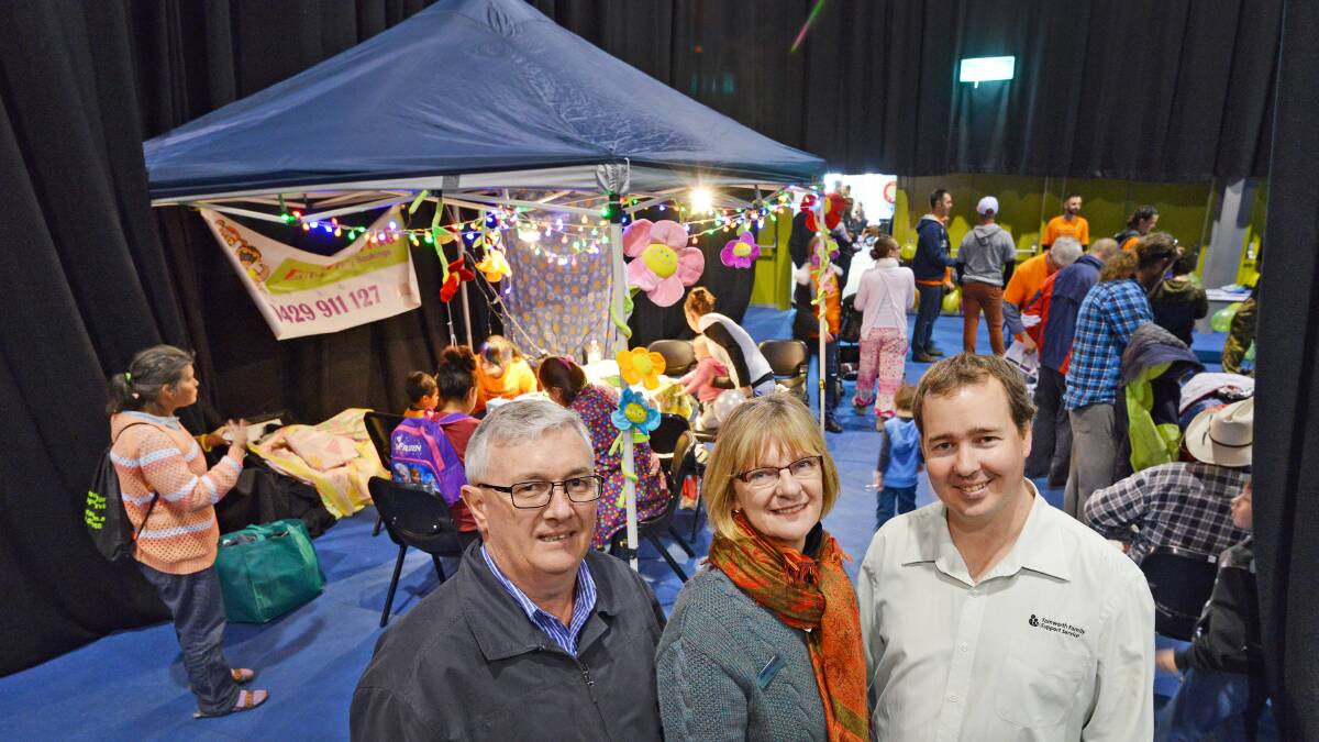 HELP AT HAND: Jim Booth (RichmondPRA), Sue Budden (Anglicare Northern Inland Partners in Recovery) and Leigh Smith (Tamworth Family Support Service) were among the support agencies and volunteers at Tamworth Homeless Connect Day yesterday at the TRECC. Photo: Barry Smith 060815BSC05
