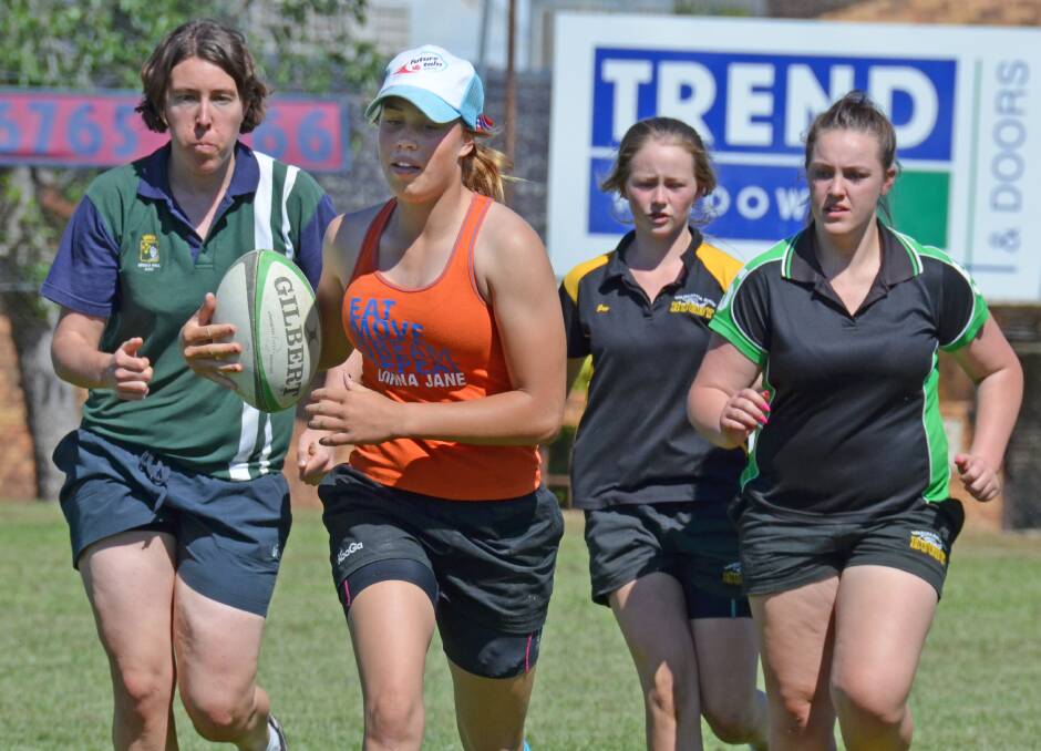 On the move at Central North training on Sunday (from left) Claire Beale, Rhiannon Byers, Jess Andrews and Carly Rose. Photo: Chris Bath 280914CBC01