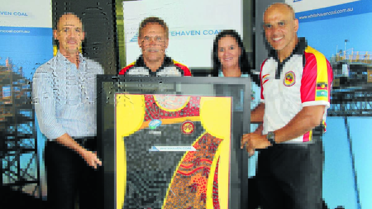 PRODUCTIVE PARTNERSHIP: From left, Whitehaven Coal executive general manager Jamie Frankcombe, Cliff Lyon, Jane Stanley and Jeff Hardy with the AIO World Cup jersey.
