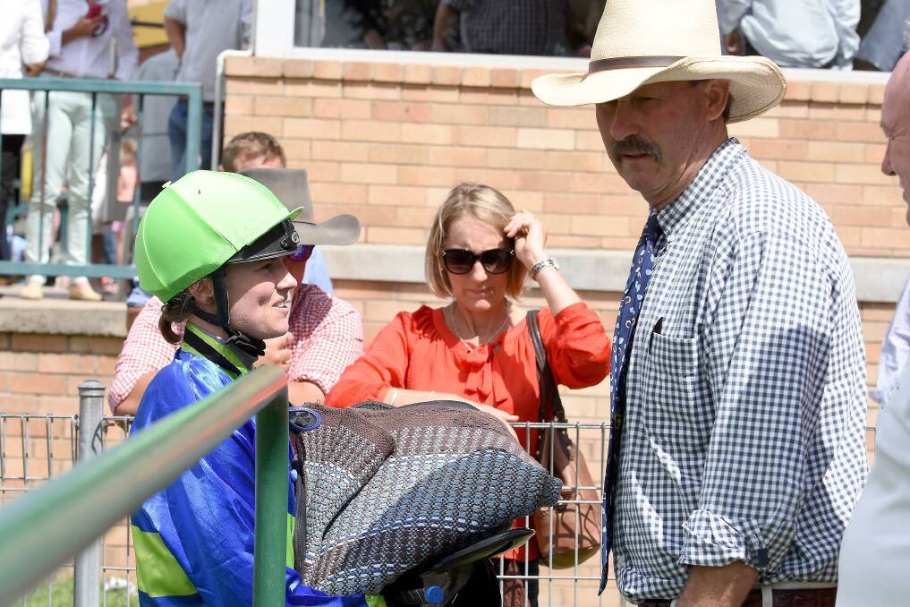 Rachael Murray and Greg Bennet confer after winning the Walcha Cup Prelude at Armidale with Pro Consul. Bennett has another non-claiming apprentice, Sam Clenton, on board his Walcha Cup favourite today. Photo:  pixonline.com.au