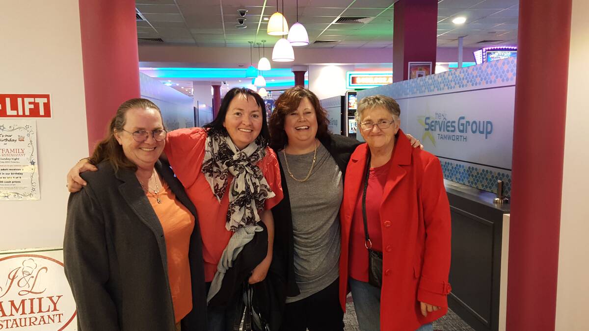 Tamworth's Melissa Crowell, third from left, caught up with some old friends as she walked through the doors of the newly-renovated Tamworth Services Club on Friday night.