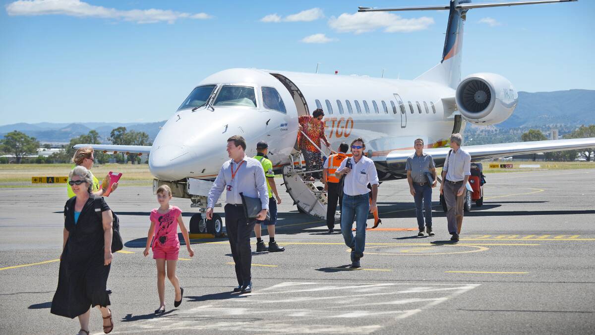 TOUCHDOWN: JetGo’s first passenger flight from Brisbane lands in Tamworth after the city has been without a direct flight for 15 months. Photo: Barry Smith 020315BSC12