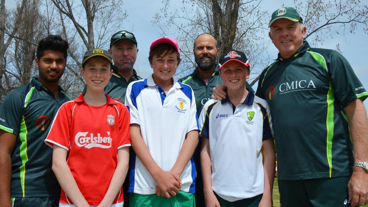 Coaches (back from left) Arj Jhala, Simon Hatherall, John Davidson and Craig McDermott (right) with (front from left) Armidale's Jacob Fernandez, Jackson Gwynne and Guyra's BJ Cameron at the camp in Armidale on Monday. Photo: Chris Bath 220914CBA01