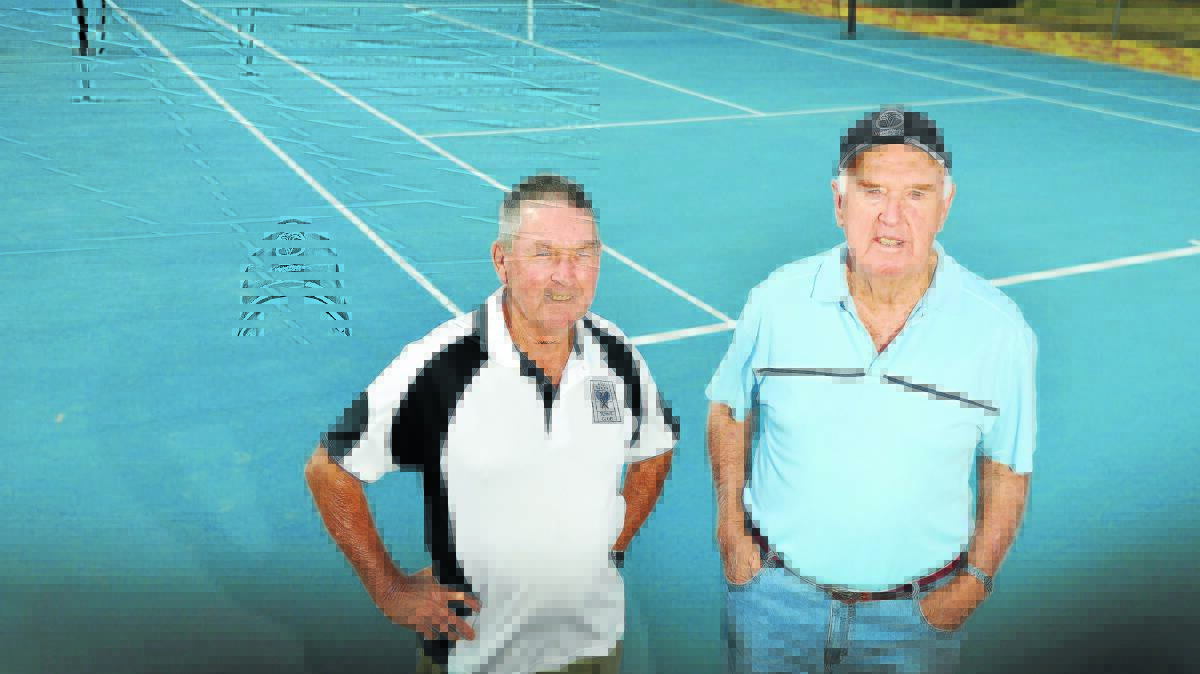 Celebrating 80 years of tennis are (from left) John Ball (president) and Keith Dietrich. Photo: Barry Smith 130416BSF02