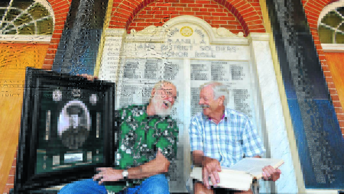 MEN OF WAR WORDS: Historical society president Ian Bignall and local sub-branch president Dennis Creer were involved in producing the Manilla history book.  Photo: Barry Smith 020413BSC17