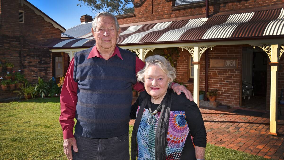 GOOD CITIZENS: Bladen and Del Brooke, who have spent many years doing community work in Tamworth, are moving to Coffs Harbour to be closer to their children. They are pictured here at Tamworth’s Calala Cottage museum, which hosted a farewell for them on Sunday. Photo: Geoff O’Neill 160815GOE01