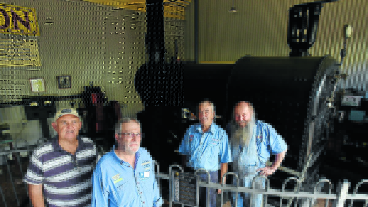 READY TO RUMBLE: Tamworth Powerstation Museum will have its John Fowler steam engines firing for visitors to see on Friday and Saturday. From left,  retired boiler operator visiting from Gladstone, Qld, Allan Pease, Powerstation volunteer Chris Lowe with steam engine operators Arthur Ruttley and Steve Bailey. Photo: Gareth Gardner 210116GGB05