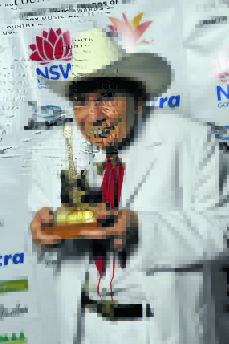 UNIQUE: Chad Morgan, pictured with his Lifetime Achievement Award from the CMAA, will become Tamworth’s next bronzed Aussie, with a bust to be installed in Bicentennial Park. 230110GOB16