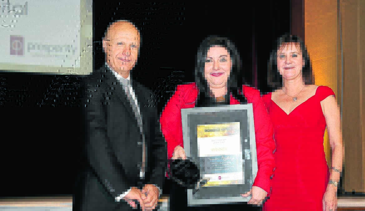 ACHIEVEMENTS: Hunter New England Health chief executive Michael DiRienzo, with Sussan Maybury, centre, and Megan Maybury.