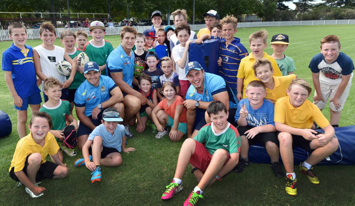 Gold Coast Titans players (from left) Nathan Friend, Jed Cartright and Carl Lawton at the Quirindi Grasshoppers come-and-try day on Thursday. Photo: Geoff O’Neill 040216GOD01