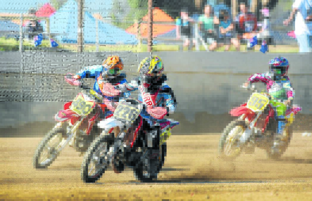 Mitchell Kruger, Caleb Wilkens and McKenzie Booth battle for position and an Australian title at Oakburn Park on Saturday. Photo: Gareth Gardner  031015GGD01