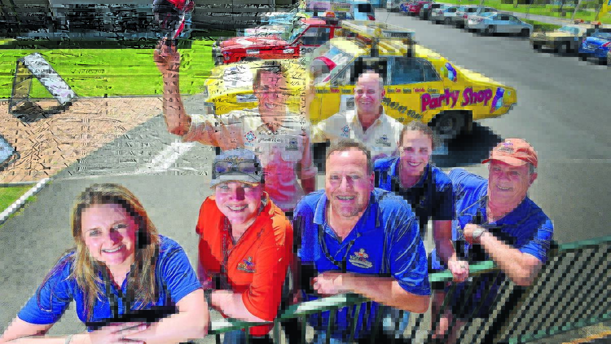 SHORT AND SWEET: Rally participants at the Big Golden Guitar. Back from left, Derek Blomfield and David Ward from Quirindi. At front, Candice Rapp, Barbara Lee Smith, Mark Smith, Heidi Jephtha and Ian Alford. Photo: Gareth Gardner 150915GGD02
