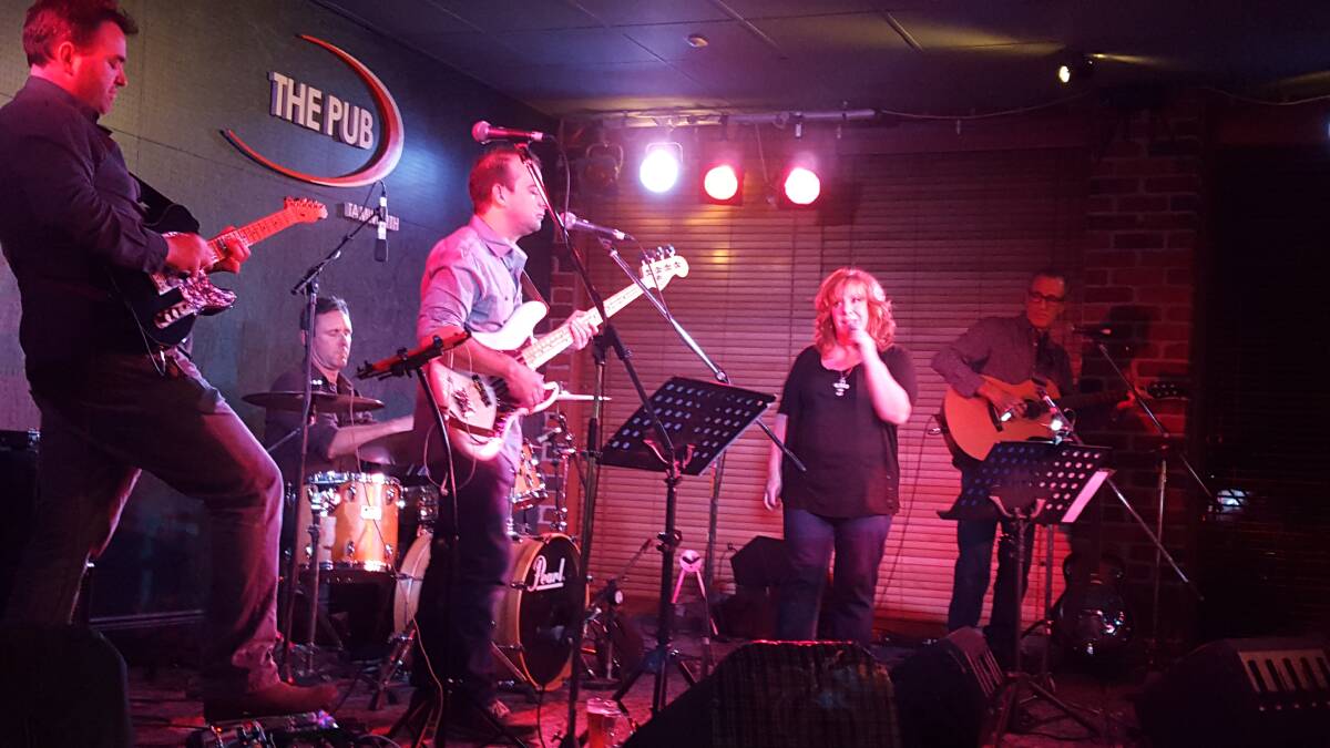 Marie Hodson and the Bootleggers on stage at The Pub on Friday night.