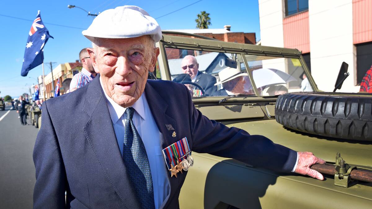 RESPECT ALWAYS: Reg Hitchen, a World War II air force veteran marched the full length of the Tamworth Anzac Day march. Photo: Geoff O’Neill 250415GOD02