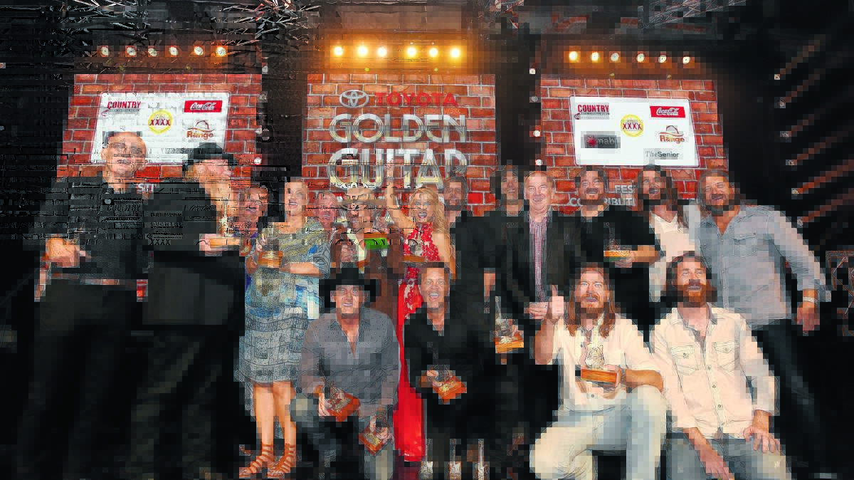 WINNERS ARE GRINNERS: 2016 Country Music Awards of Australia winners enjoy the spotlight at the conclusion of the night.  Photo: Gareth Gardner  230116GGB02
