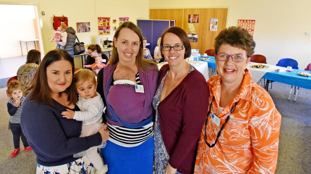 HELP AT HAND: Amy Henry with 11-month-old Harper, Alex Smith with 11-week-old Freddie, Vanessa Johnson and Maria Ryan swap mothering tips at a recent Tamworth Australian Breastfeeding Association meeting. Photo: Geoff O’Neill 070515GOB01