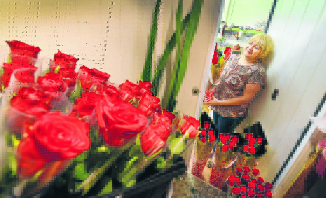 SYMBOLIC: Margaret Wilkinson said red roses were the traditional Valentine’s Day flower. Photo: Barry Smith 120216BSE10