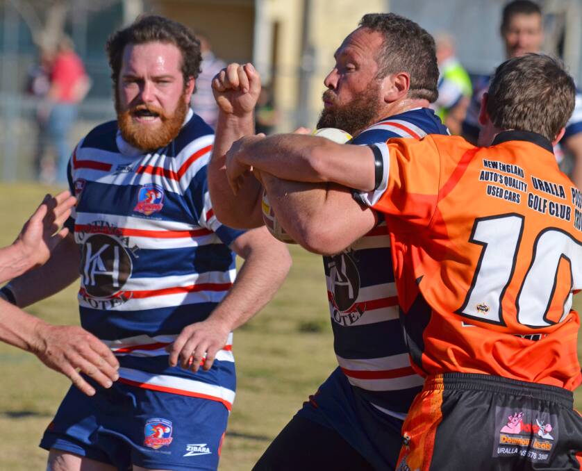 Kootingal front-rowers Grayson Bradbury and Tim Milson (ball) have been at the centre of the Roosters’ run to the minor premiership. Photo:Chris Bath 150815CBA18
