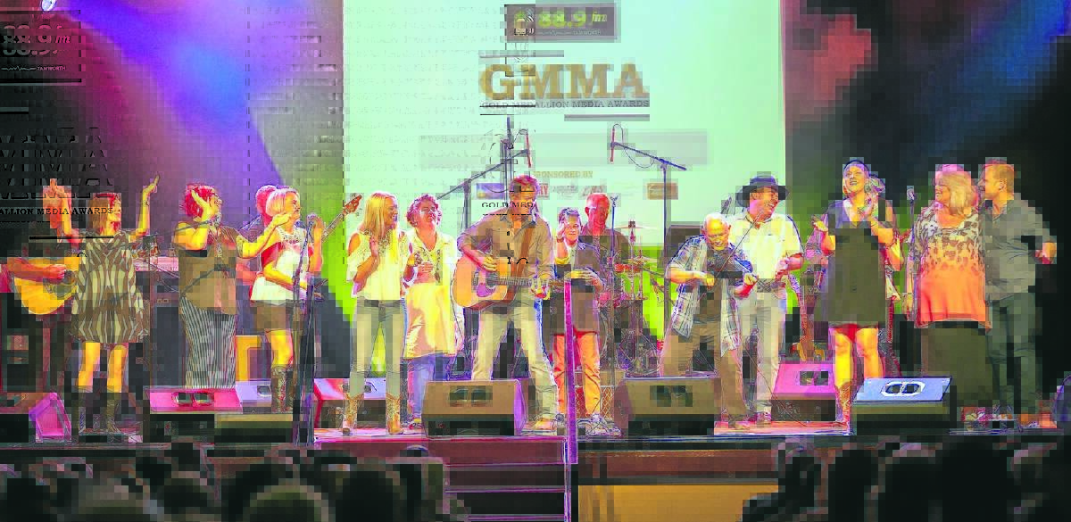 DUSTY FAREWELL: Tamworth MP Kevin Anderson led the Gold Medallion Media Awards finale, Lights On The Hill, joined by the artists who performed on the night. Photo: June Underwood