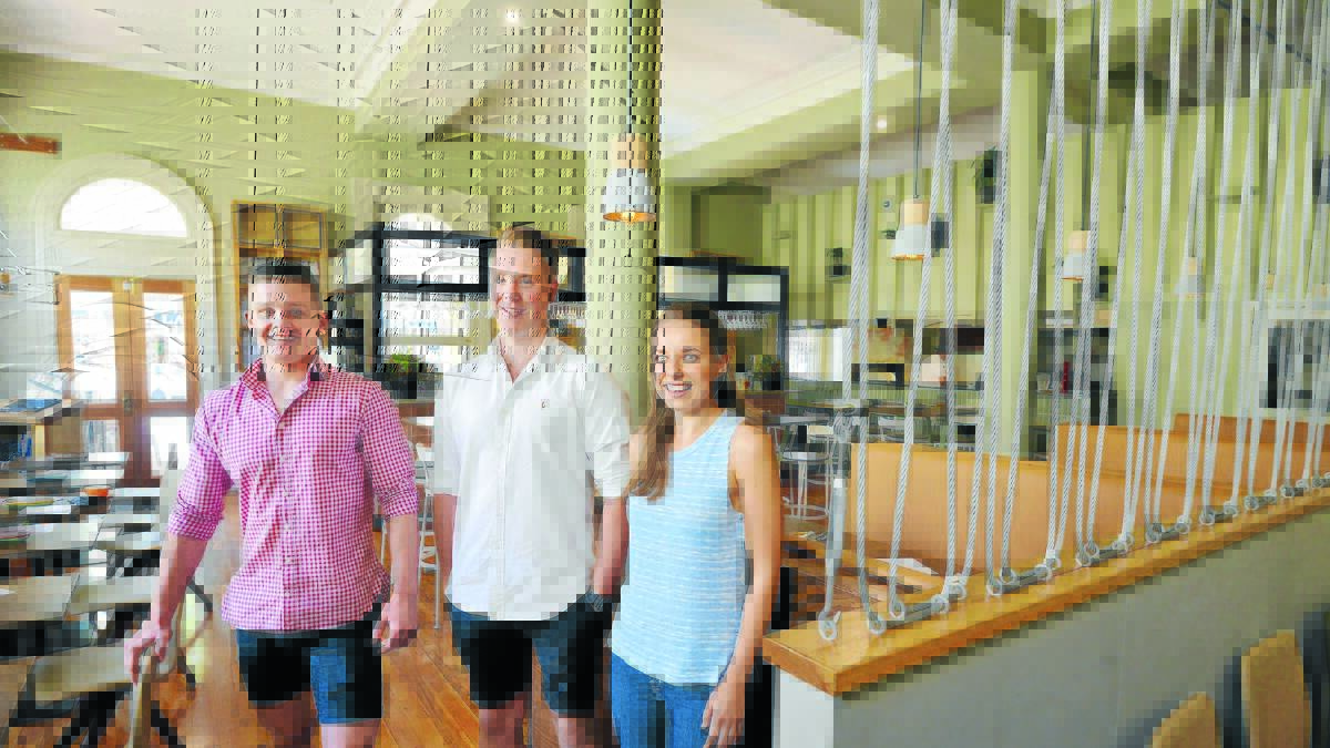 TOP SPOT: The Pig and Tinder Box managers Blake Etheridge, Henry Cameron and Claudia Byrnes were stoked with the venue’s inclusion on a regional top 100 restaurants list. Photo: Barry Smith 310116BSC03