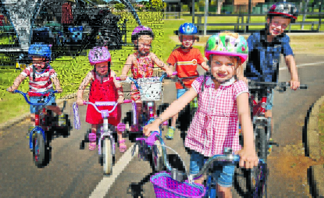 ON YOUR BIKE: (Front) Mia Murray celebrated her fifth birthday yesterday with (from left) Jacob Garnett, Cleo Cook, Ruby Cook, Cooper Garnett and Lachlan Murray at the Road Safety Park. Photo: Geoff O’Neill 051015GOA02