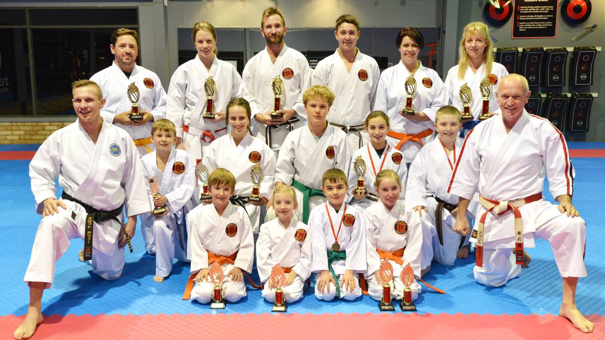 Chaffey’s Black Belt Academy Tournament winners (front from left) Scott Chaffey, Luke Leys, Amelia Cohen, Bailey Bower, Riley Leys and Clint Chaffey (middle from left) Macklin George, Samarah Thrift, Edmund Bourke, Evie Bower and William Bridge (back from left) Dave Cronin, Kristie Chaffey, Scott Cohen, Lachlan Cooke, Melissa Laupepa and Jane Cohen.  Photo: Barry Smith  220715BSC01