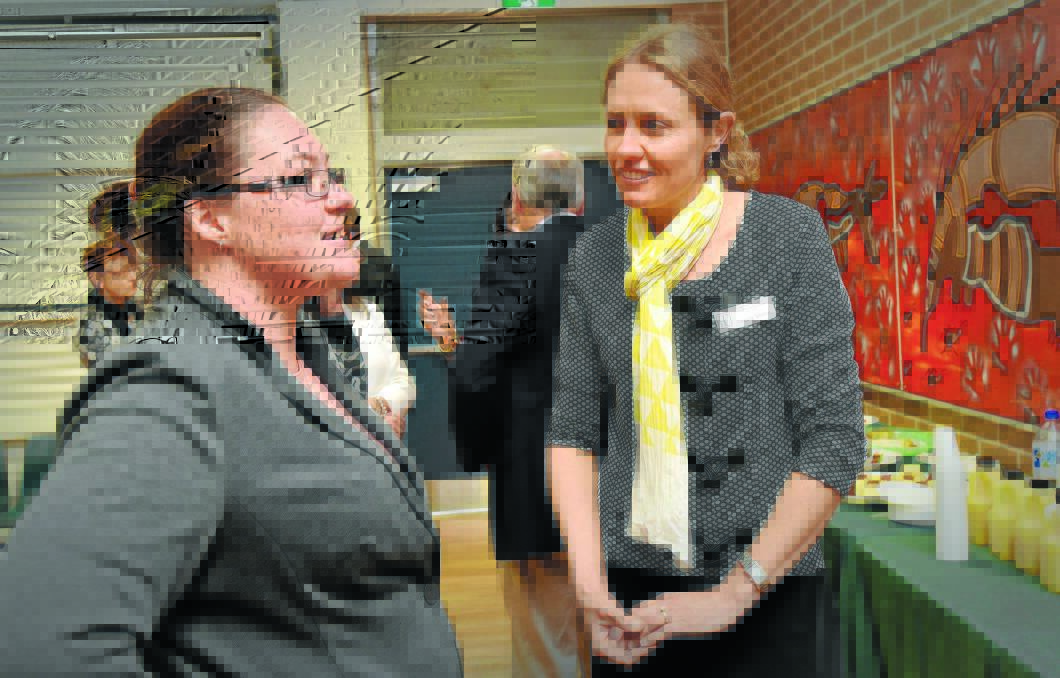 EDUCATION SPOTLIGHT: New England councillor Angela Martin, right,  chats to parent Courtny Ryan, from Sandon Public School in Armidale, at the Hillvue Public forum. Photo: Geoff O’Neill 250815GOB01