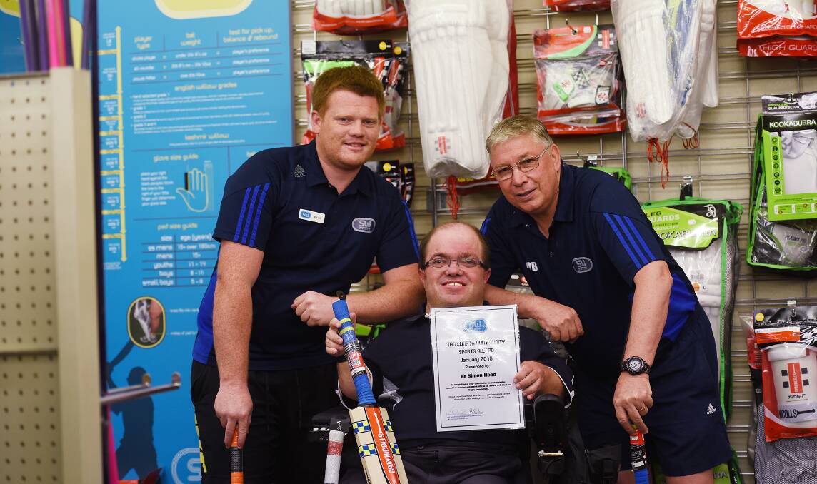 Sportsman’s Warehouse chief Rick Craig (left) and assistant Bob Barber with the first 
Volunteer of the Month for 2016 Simon Hood. Photo: Gareth Gardner  270116GGC01