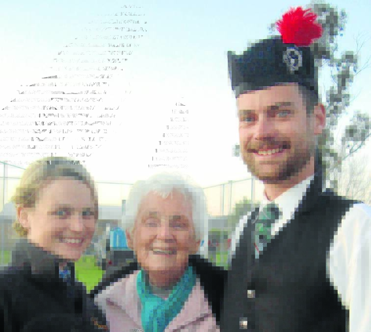 IN THE BLOOD: Being part of a pipe band is as natural as breathing in and out for Tamworth’s Hunt family – Alex, 22, and Jamie, 24, pictured with their nan, Rhonda Clow from Kootingal.