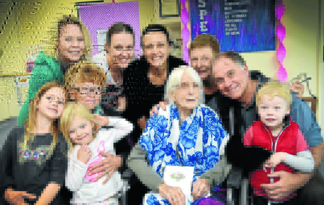 PARTY GIRL: Audrey Cross with family at her 104th birthday celebrations. Photo: Geoff O’Neill 290615GOB01