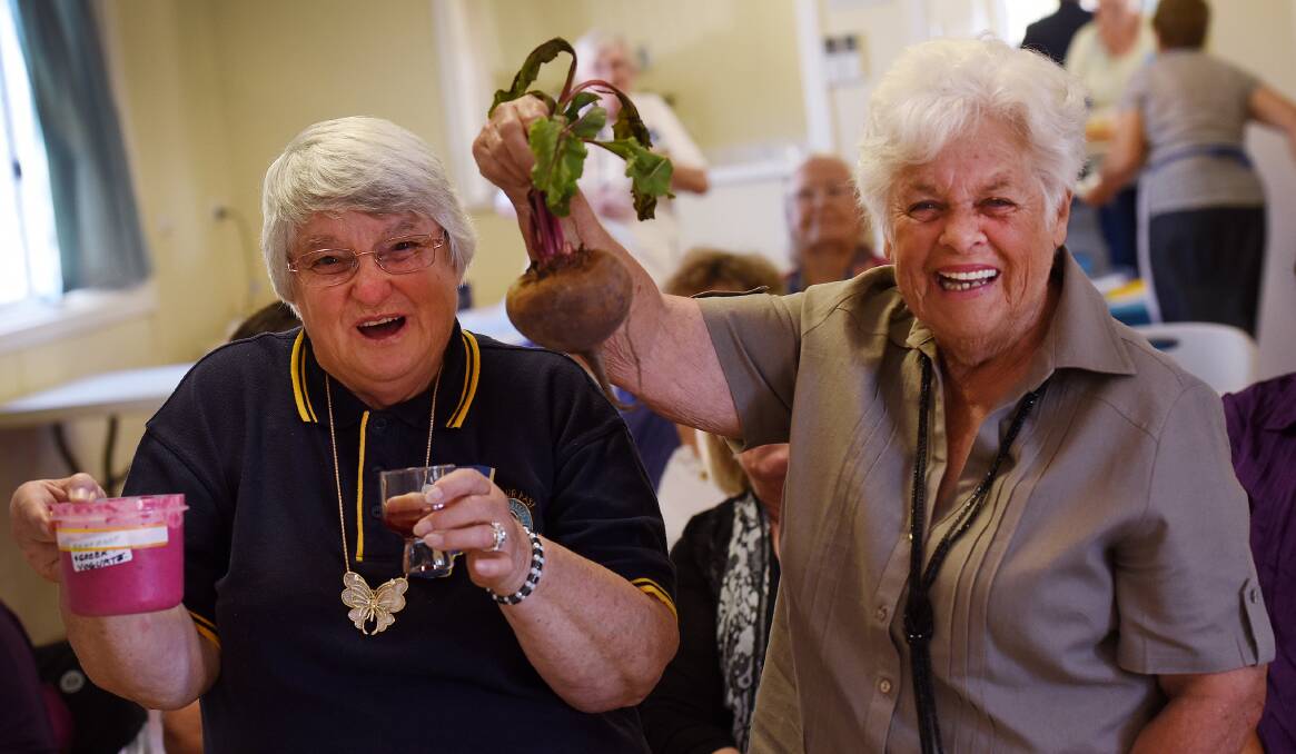 UNBEATABLE: CWA members Bev Tearle, left, and Doreen Goddard with some of the beaut things you can make from the humble beetroot. Photo: Gareth Gardner  160315GGC02