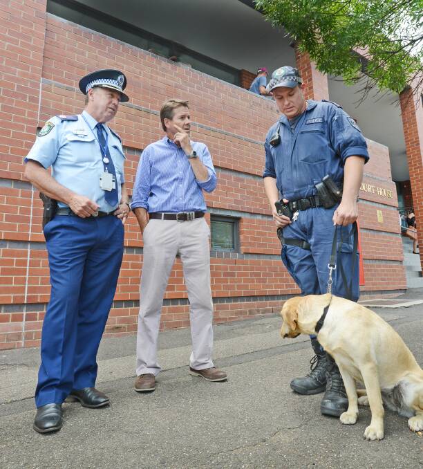 PERMANENT PLANS: A full time dual capability dog position has been announced for Tamworth hot on the heels of a three month trial which kicked off yesterday with Senior Constable Kaine Schwartz and Angel, pictured with Police Assistant Commisioner Geoff McKechnie, left, and Kevin Anderson. Photo: Barry Smith 200115BSH04