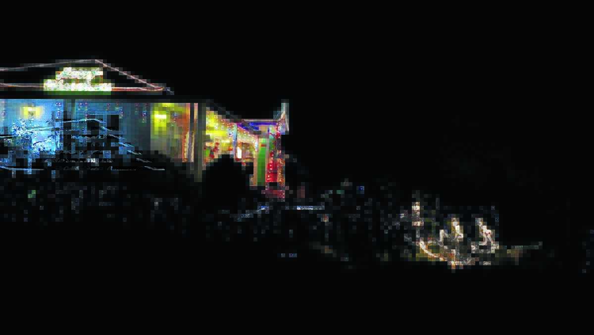 SHINING SPIRIT: Part of the Christmas light display in Gill St, Kootingal.