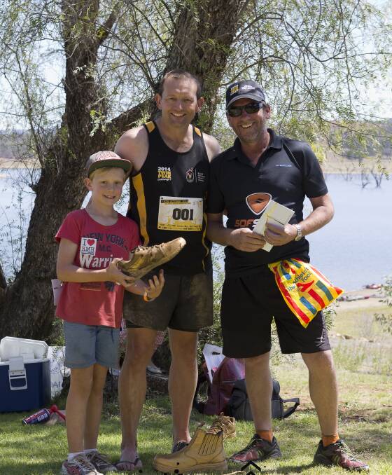 TOUGH CHALLENGE: Five-time Twin Peak sponsor David Barnett (centre) is 
pictured here with his son Archie and Athletes Foot Tamworth owner Andrew Larpent. Photo: Heidi Manning