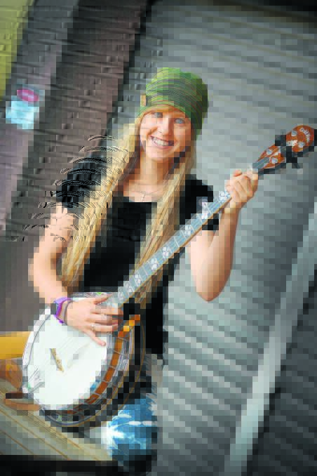 EXCITING OPPORTUNITIES: Tamworth banjo player Chloe Nott has been accepted to the CMAA Academy of Country Music. Photo: Barry Smith 061115BSA02