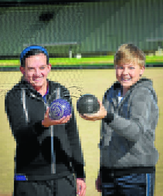 Junior bowlers are wanted and welcome to more coaching clinics at Tamworth's Oxley Bowling Club this 
Saturday. Young bowlers Alyse Peters-McMillan (left) and Connor Orman welcome all ages to take part.  Photo: Gareth Gardner 180715GGA03