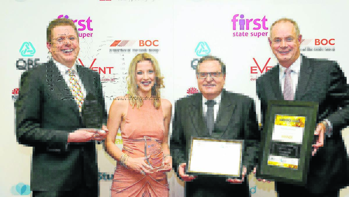 WINNING SMILES: Receiving the award on behalf of the North West Cancer Centre are, from left,  Dave Wills (chief radiation therapist), Jenna Gilshenan (radiation therapist) Tony Proietto (Hunter New England Health's director cancer services) and Brad Hanson (hospital general manager).
