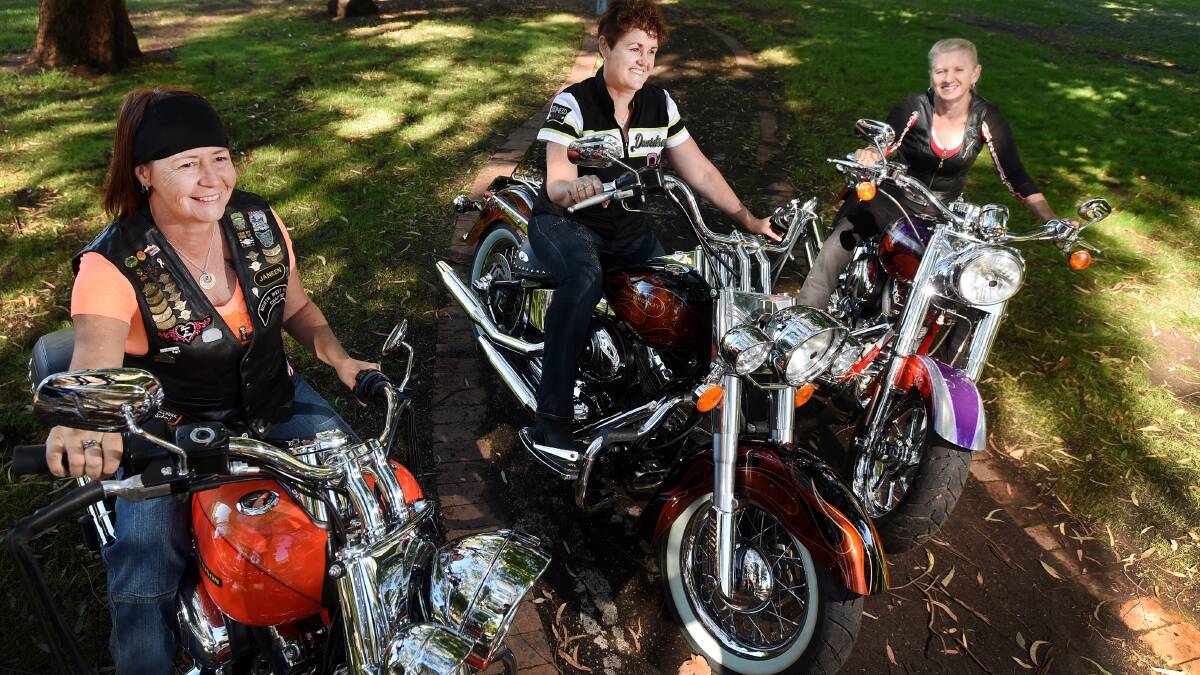 NATIONAL RALLY STARTS FRIDAY: Janeen Morgan, left, Annette Williamson and Alana Embleton say you're never too old to enjoy life and have never had so much fun until they bought their Harley-Davidsons. 
Photo: Gareth Gardner 230215GGB01