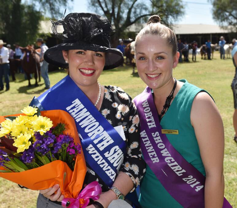 SUNNY SHOWGIRLS: Tamworth Showgirl 2015 Annabelle Walsh, left, with the 2014 showgirl Brydie Everson.  140315GOD08