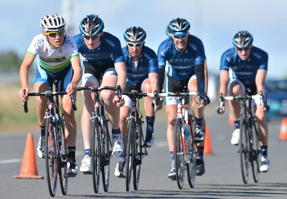 Sam Jenner leads a Tamworth  A Grade criterium in November 2013 from Mick Sherwood, Phil Kelaher and Ray Griffin. Photo: Barry Smith  171113BSA06