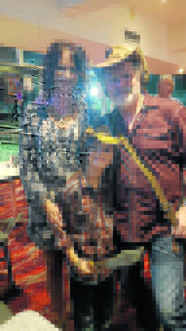 FAMILY: Kate and Bill Chambers with son Tyler.