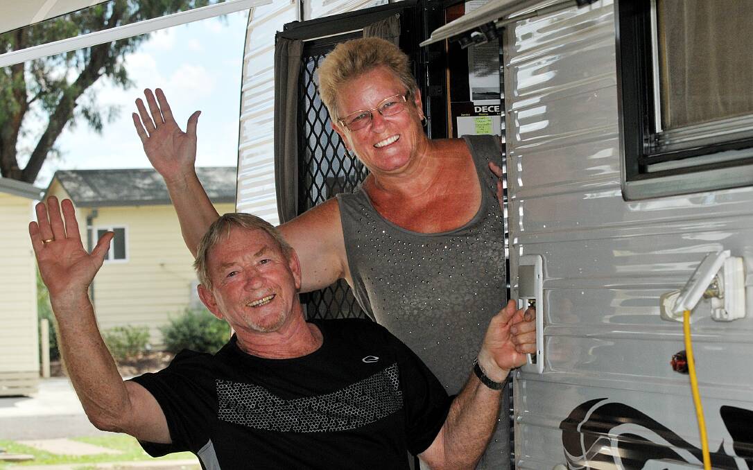 HAPPY EARLY CAMPERS: Country music festival visitors Ray and Gayle Wilmer have secured an early spot for their caravan. Photo: Geoff O’Neill 081214GOF01