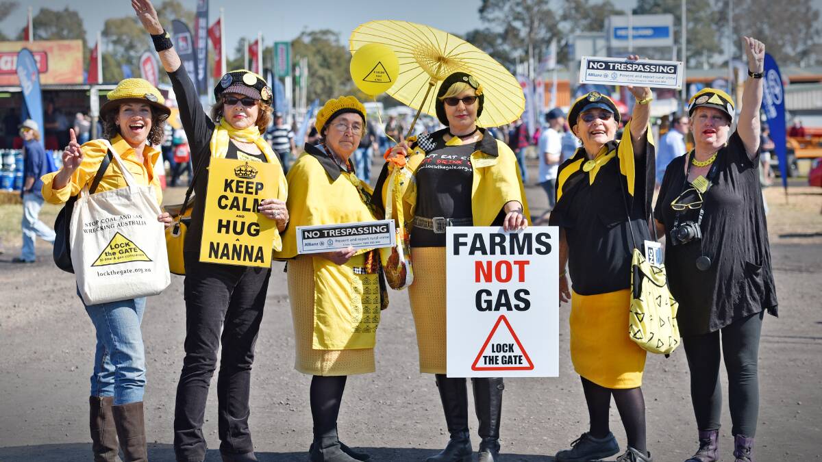 FRESH AIR: Among the thousands at AgQuip were some Knitting Nannas, the protest group against CSG, including, from left, Tania Marshall, Anne Thompson, Felicity Cahill, Louise Somerville, Meryl Condon and Jenny Leunig. Photo: Geoff O’Neill 200815GOA07