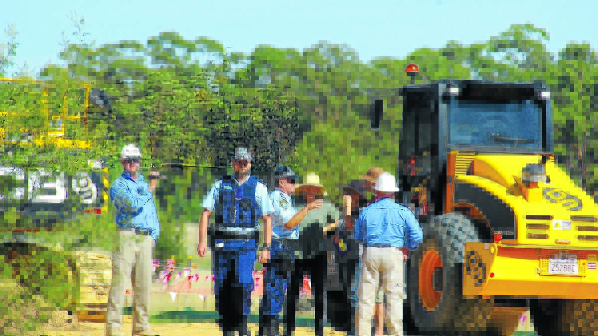 TAKING A STAND: Police confront the CSG protesters on Monday.