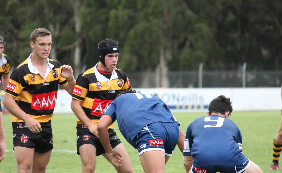 Lachlan Duwakin (left) and Will McAuliffe in action for the Tiger Under 18s against Newcastle Rebels last Saturday. Today they have a big semi-final against Western Rams in Dubbo.