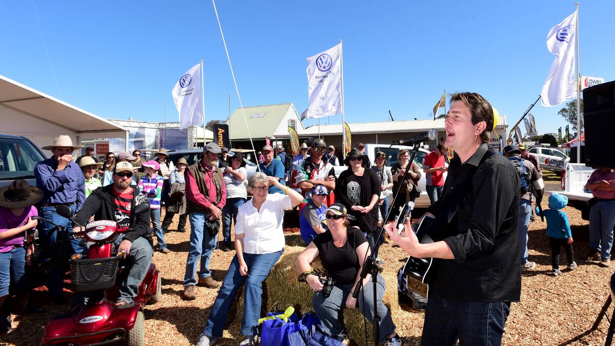 STAR POWER: Country superstar Adam Harvey sang up a storm at AgQuip on the 
Volkswagen Amarok stand. 190815GGC03