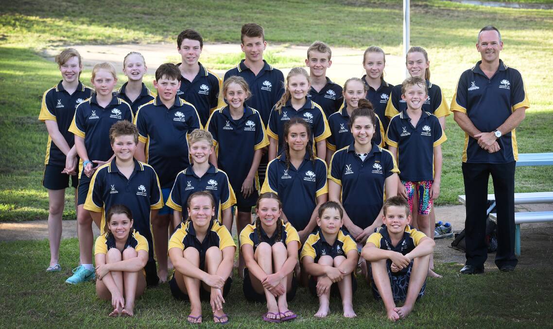 High-achieving Sharks  (back  from left)  Lyndell Boschma, Kathryn Burke, Ed George, Will Burnett, Josh Carter, Alex Burnett, Daisey George and president Wayne Riggien,  (third row from left)  Aleeci Francise, Benjamine Duddy, Alex Hayes, Chloe McWilliam, Clementine Monet and Hugo Pollard, (second row from left)  Josh Riggien, Max Rumble, Mikaela Short, Amelia Summers,  (front row from left)  Lucy-Kate Thompson, Eloise Turner, Georgia Vander Graff, Lachlan Woods and William Woods. Absent – Patrick Bolte, Josie Chick, Cody Cottrell-Dormer, Nicholas Farmer, Thomas Kable, Liam, Robert and Thomas Mair, Olivia Saunders, Amity Smith, Ryan Taggart, Angus and Benjamin Wallace.  Photo: Gareth Gardner  101115GGF01