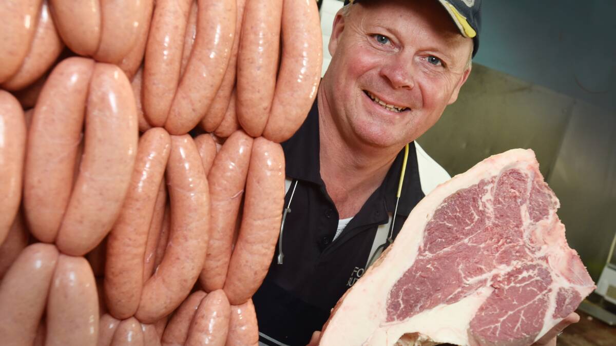 FATHERS FIRE UP: Ford Butchery owner Paul Avery will be among those who will fire up the barbecue tomorrow for Father’s Day, and he’s got some of the best tips in the business. Photo: Geoff O’Neill 280815GOG01
