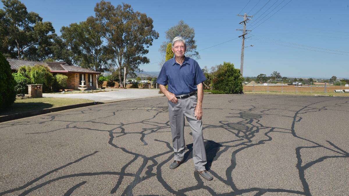 NEIGHBOUR NO NO: Max Ellicott says the road works and intersection for the estate are not on, but no one will listen to their concerns about the road alignment issues. Photo: Barry Smith 061015BSD01