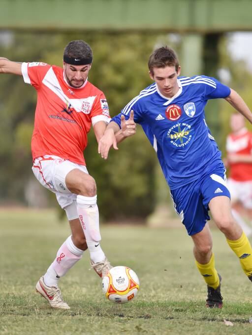 OVA’s Dan Cannon has front position on Moree’s Simon Davies during their clash on Saturday. Cannon scored the Mushies’ second goal in their 6-nil win. Photo: Barry Smith 160416BSC24